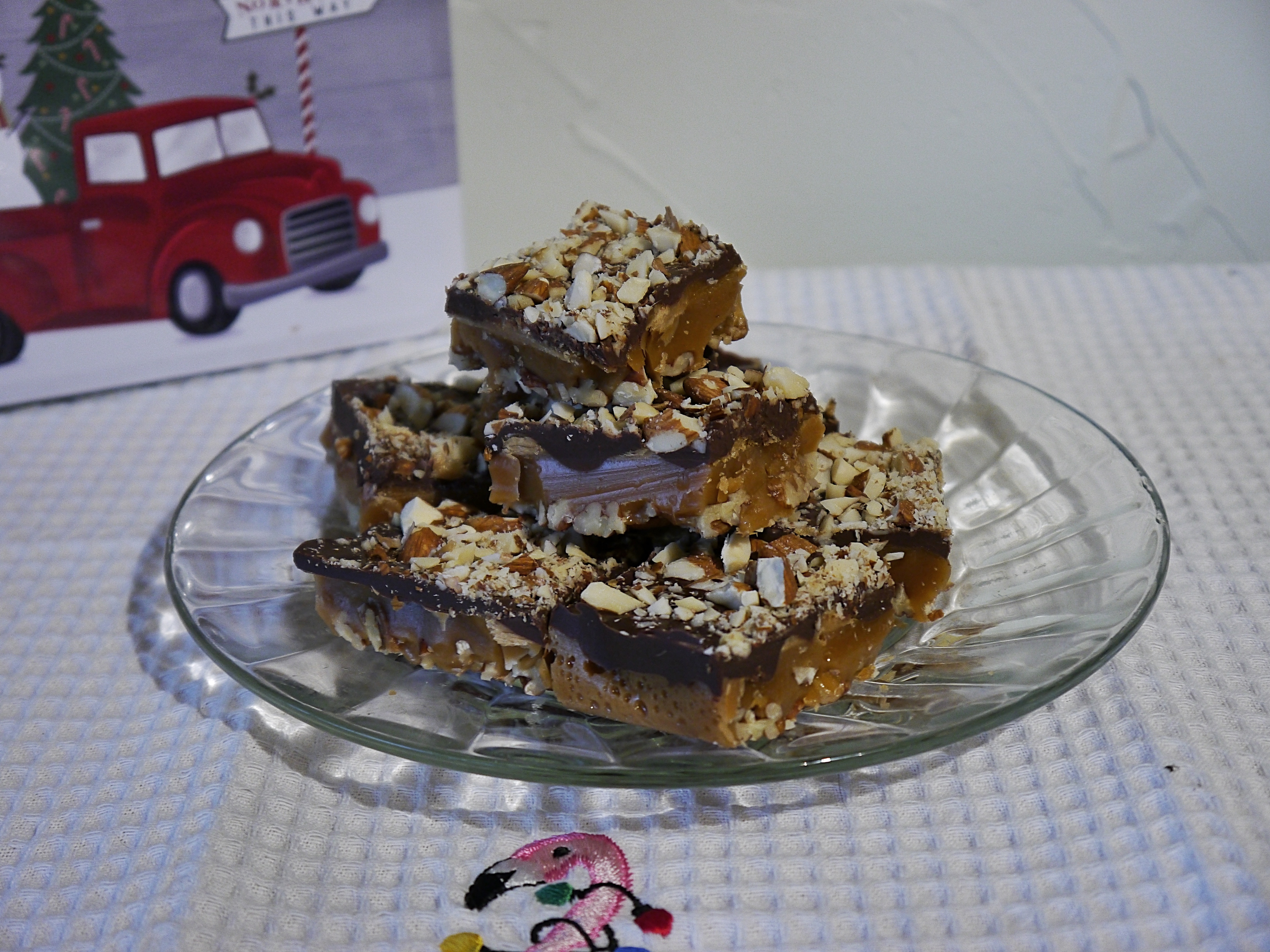 Toffee stacked high on a clear plate