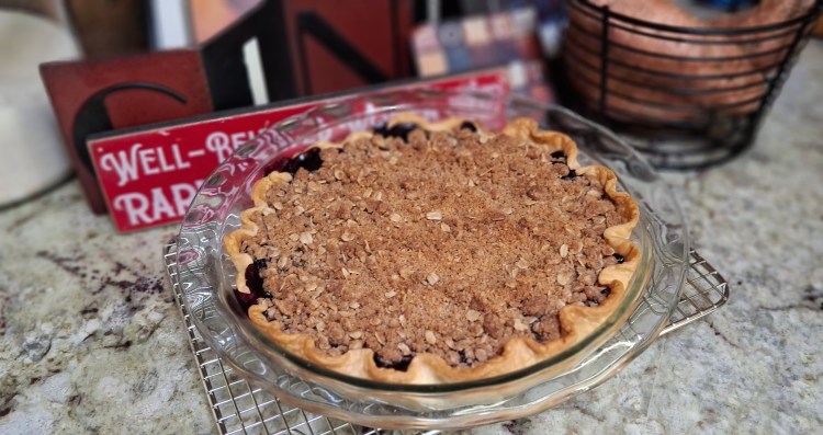 Baked blueberry pie with crumble topping