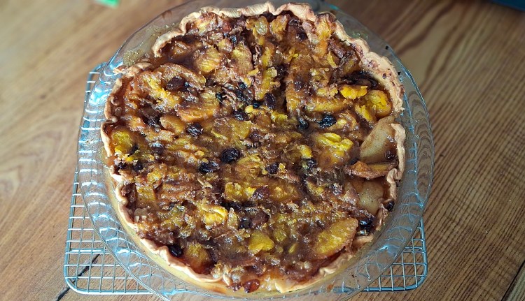 1670 baked pumpkin pie on table