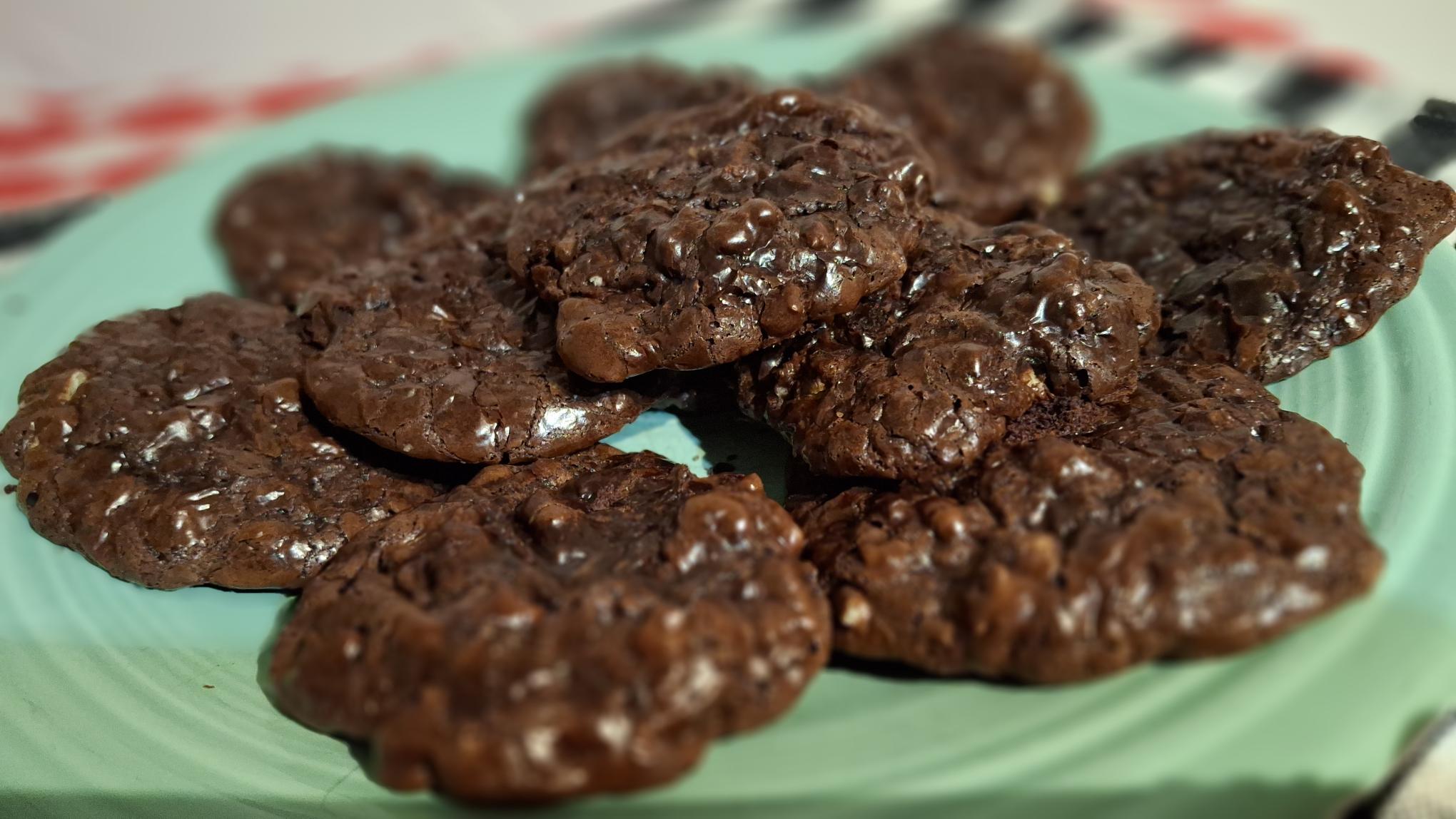 Walnut Chocolate cookies on a green plate