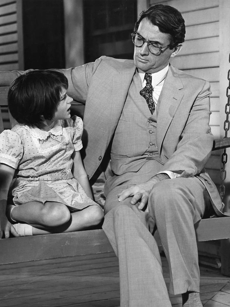 Mary Badham, Gregory Peck on the porch swing in To Kill A Mockingbird